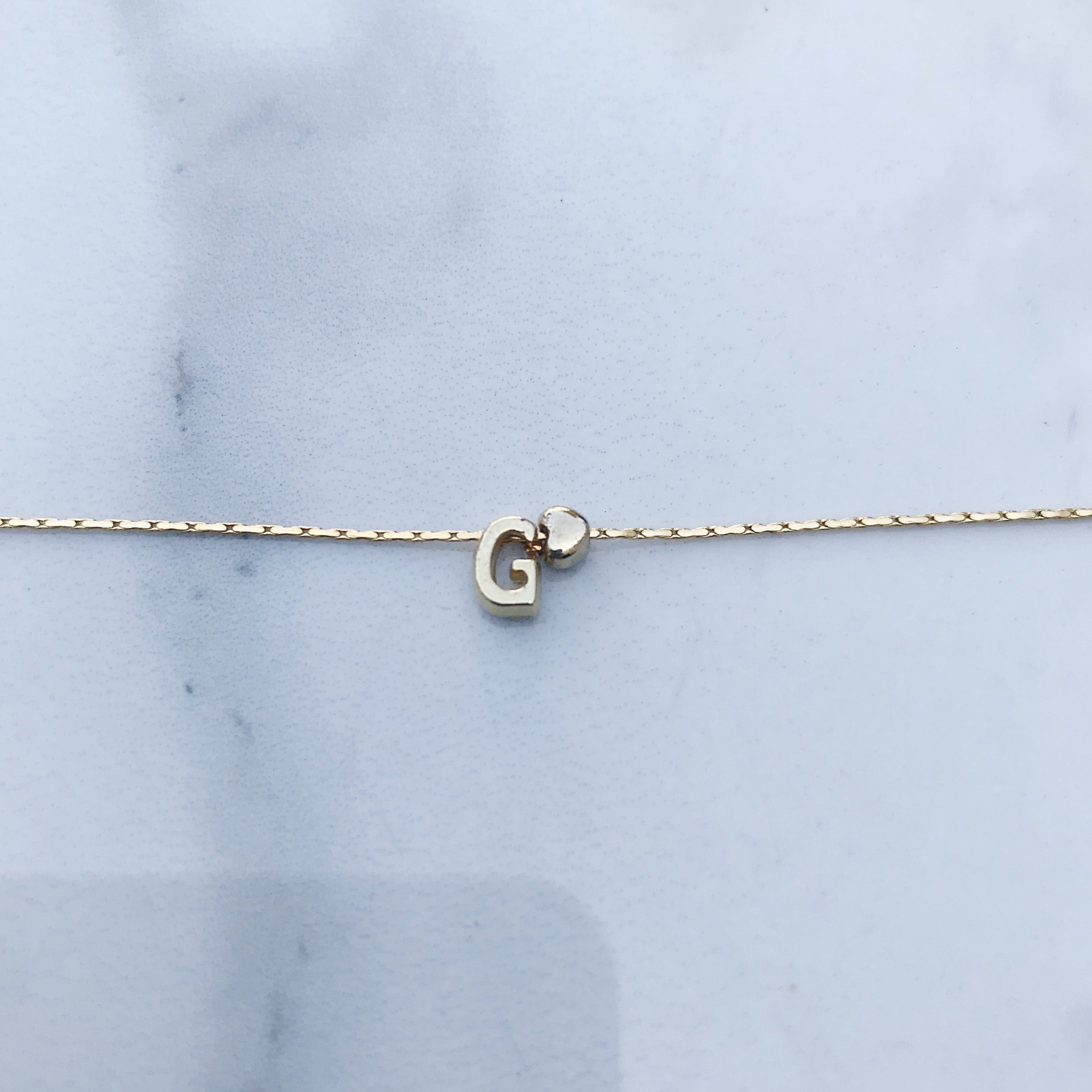 Pulsera letra mini corazón