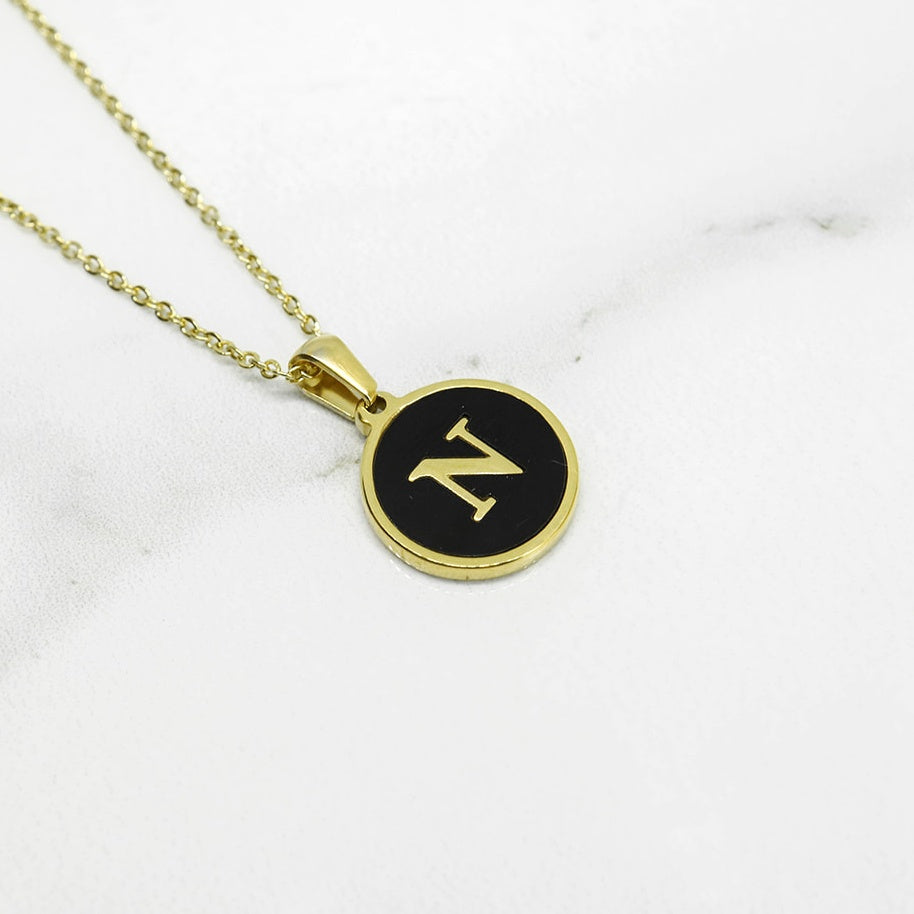 Collar Letra U y J Negra